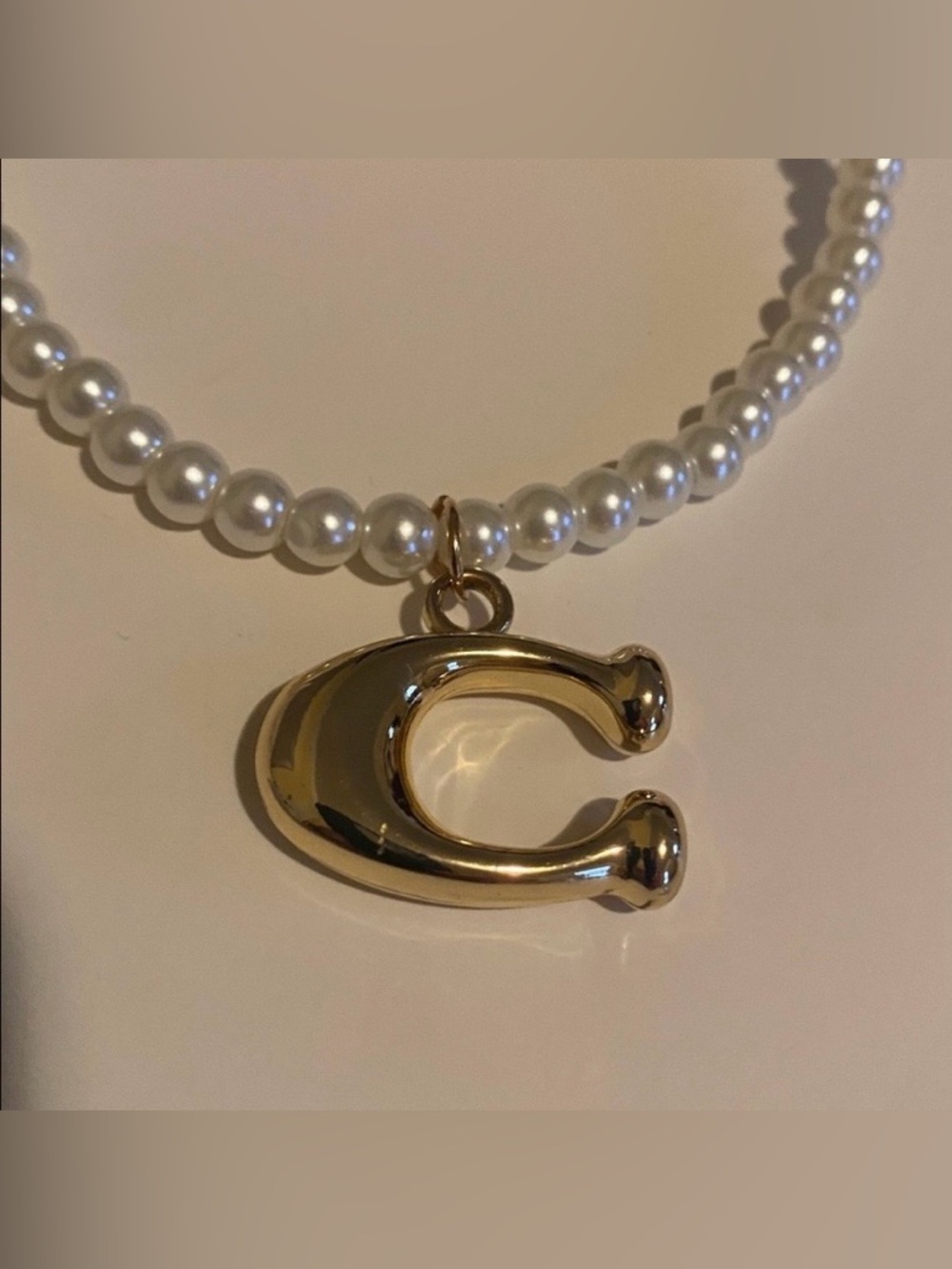 Coach
Coach letter C Charm